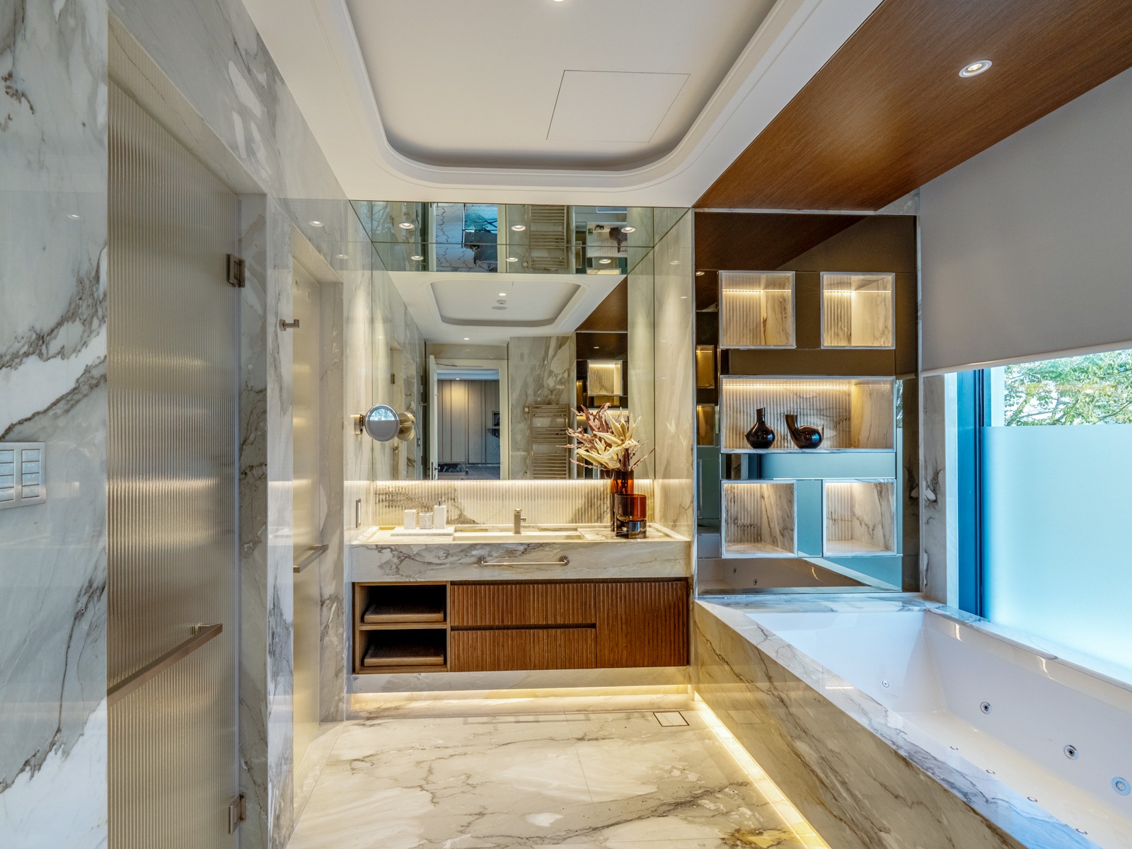 Master bathroom with marble and jacuzzi