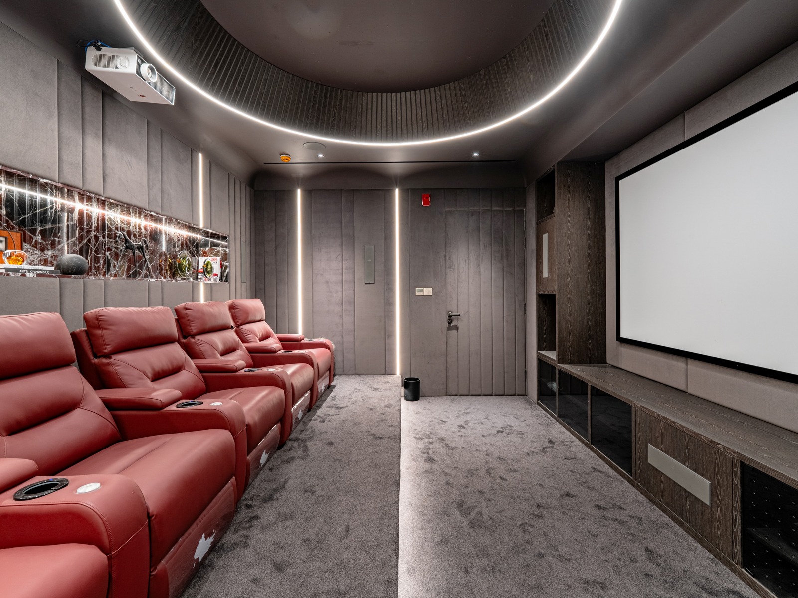 Private cinema room with leather recliners