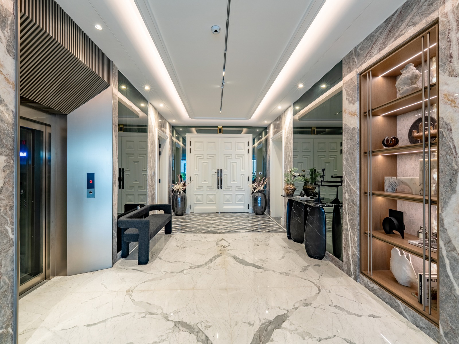 Foyer with private elevator and display niches